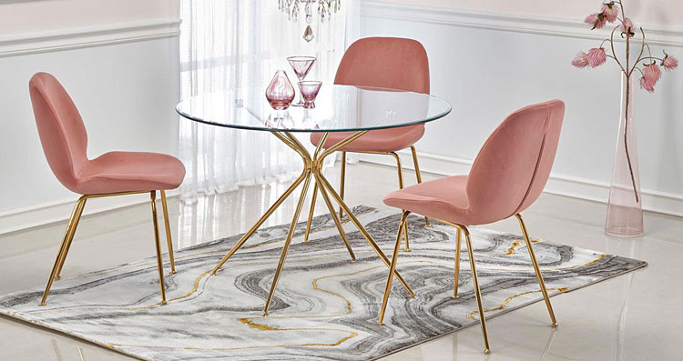 okrągły stół w stylu glamour ze złotymi nogami