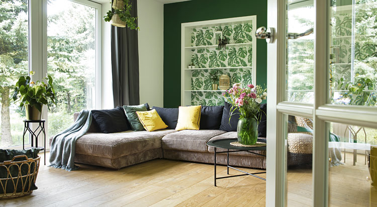 wygodna tapicerowana kanapa narożna w salonie